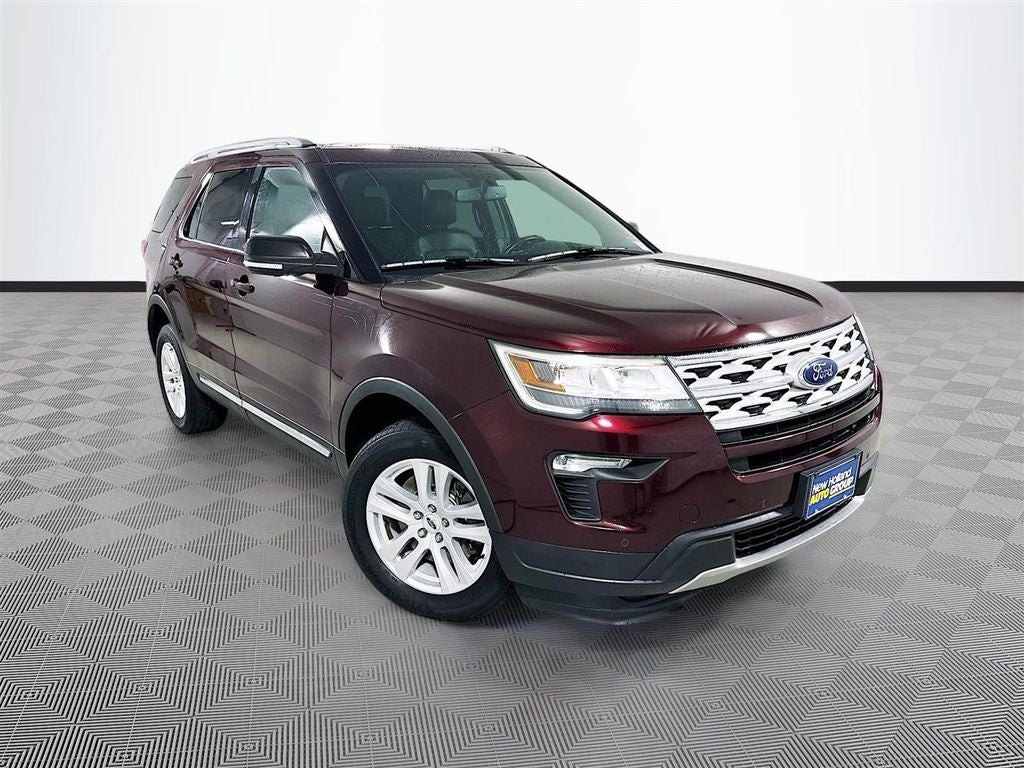 2018 Ford Explorer XLT in Burgundy — front three-quarter view