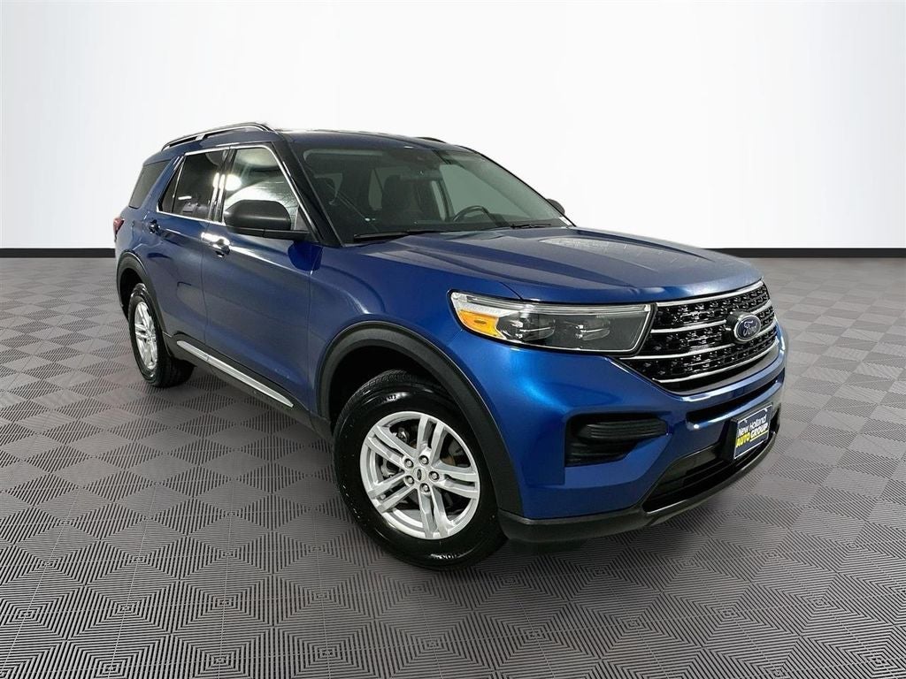 2021 Ford Explorer XLT in Blue Metallic — front three-quarter view