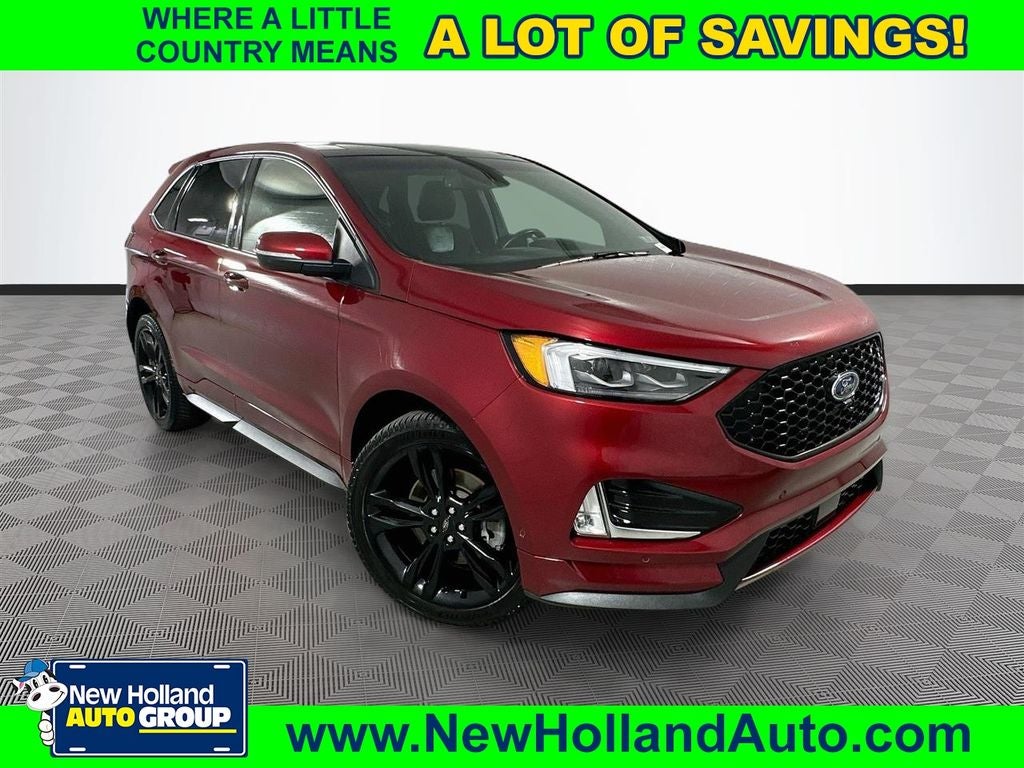 2019 Ford Edge ST in Ruby Red — front three-quarter view