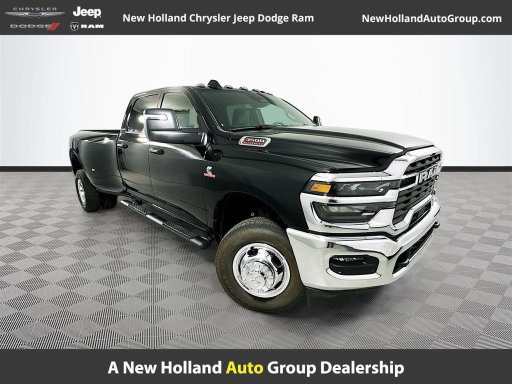2026 RAM 3500 Tradesman in Diamond Black Crystal Pearl-Coat Exterior Paint — front three-quarter view