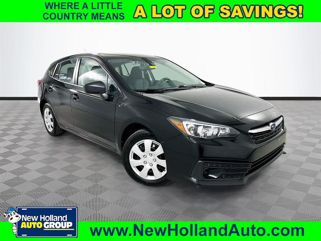 2023 Subaru Impreza Base in Crystal Black Silica — front three-quarter view